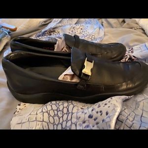 Prada slip on black loafers with rugged rubber sole — extremely comfortable